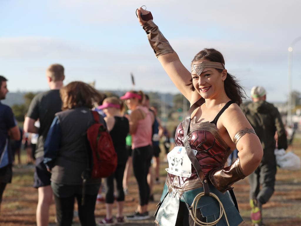 Katherine Kidd dressed as Wonder Woman running in the 2019 City to Casino. Picture: LUKE BOWDEN