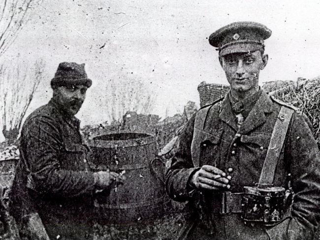 1914 : Soldiers take a break during the unofficial Christmas truce in 1914, during World War i [One] when British and German soldiers stopped fighting over Christmas. The event is featured in TV documentary film "The Christmas Truce".