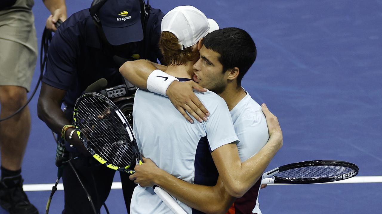 Alcaraz hugs Sinner after their 2022 US Open quarterfinal.