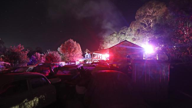 Tasmania Fire Service attend a large fire on a property in Summerleas Rd in Fern Tree. Picture: LUKE BOWDEN