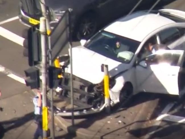 DAILY TELEGRAPH. JULY 20, 2023., , Screenshot of a dramatic car chase in North Western Sydney today where a man and a woman were arrested by police after the car crashed. Pic: Sky News.