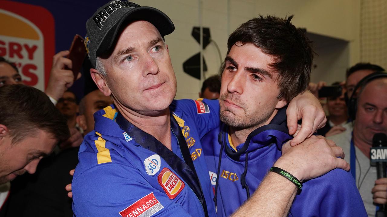 Adam Simpson consoles the suspended Andrew Gaff after the grand final.