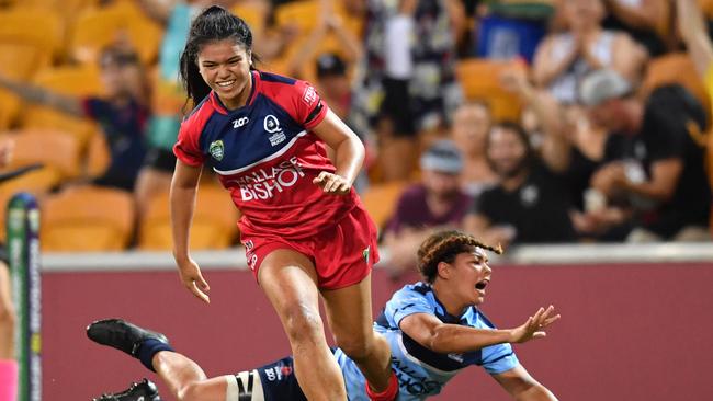 Queensland Reds player Alysia Lefau-Fakaosilea scores the winning try in the Global Tens. Pic: AAP