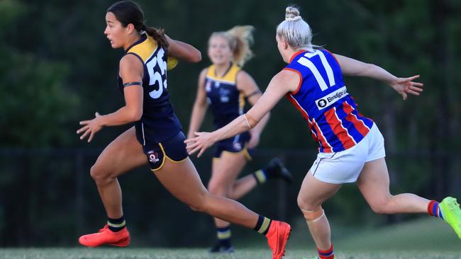 August 16, Gold Coast, Queensland - Lucy Single from Bond University in action against Wilston Grange in the Queensland AFLW played at Bond University on the Gold Coast. Scott Powick Newscorp