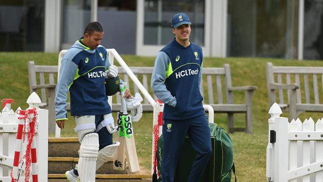 Sam Konstas and Usman Khawaja walk at a training session in Beckenham, England on Wednesday. Picture: Philip Brown/Getty Images