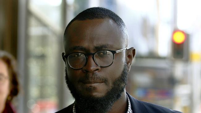 Martins Keyen leaves Downing Centre Court after a sentencing hearing last month. Picture: John Appleyard