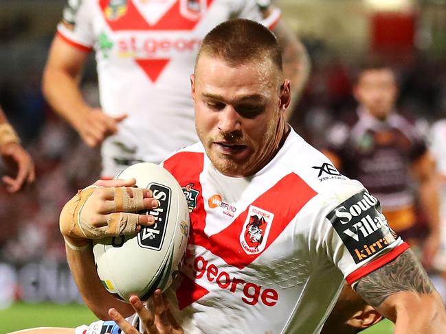 SYDNEY, NEW SOUTH WALES - MARCH 08:  Euan Aitken of the Dragons scores a try during the round one NRL match between the St George Illawarra Dragons and the Brisbane Broncos at UOW Jubilee Oval on March 8, 2018 in Sydney, Australia.  (Photo by Mark Kolbe/Getty Images)