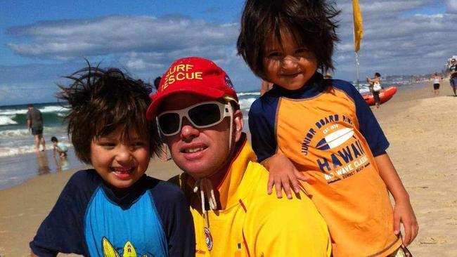 Wayne Heneker with two of his children, Heath, in the blue shirt, and Hayden.