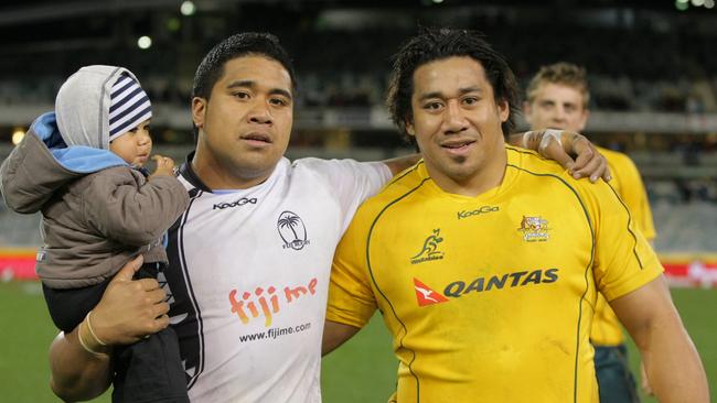 Brothers Campese (L) and Salesi Ma'afu after they faced off in the Australia v Fiji international match.