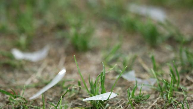 Shards of hard plastic litter the pitch during the Wanderers-Jets game. (Matt King/Getty Images)