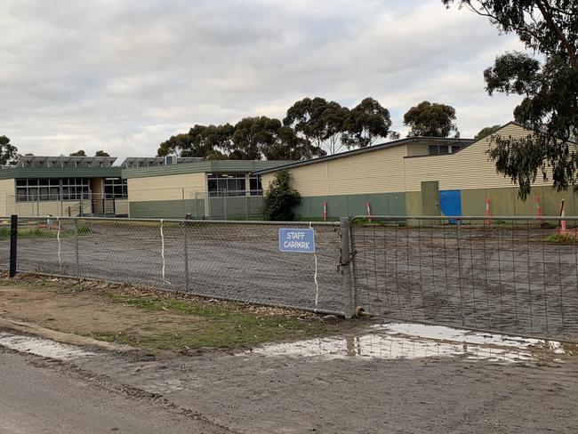 Mystery flood forces school parking upheaval