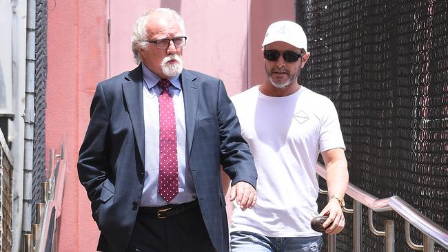 Murder accused Jayden Moorea, leaves the Southport Watchouse after he was fitted with a GPS tracking device. (AAP Image/Dave Hunt) 