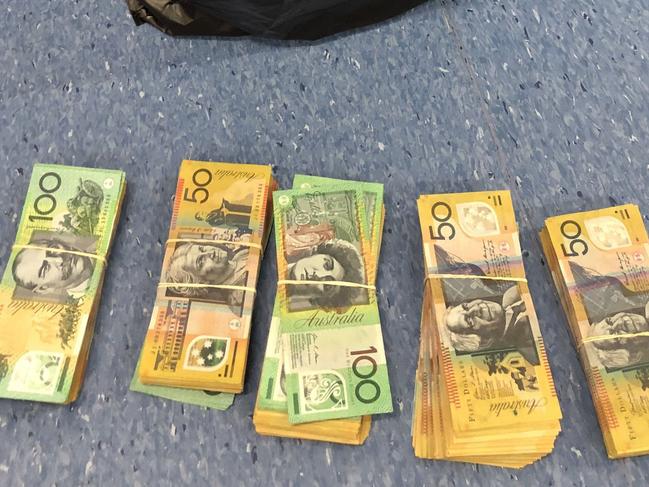 Detectives seized $70,000 cash during an alleged money laundering investigation.