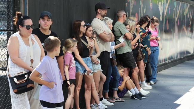Fans wait outside the Crown Hotel in Sydney for Travis Kelce to arrive on Thursday morning. Picture: Rohan Kelly