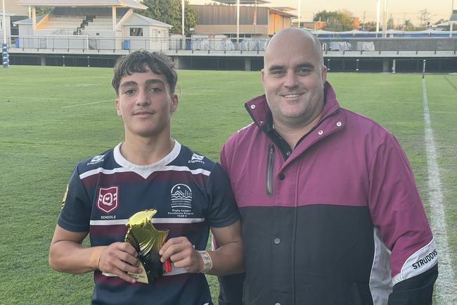 Player of the Year Cleveland Mackay and Struddys representative Damien Howells.