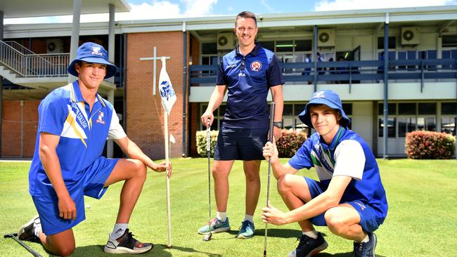 Ignatius Park College students Orlando Sartori 16 and Darcy Keir 16 with Pastoral Leader Chris Rigano, on the school's putting green. Picture: Alix Sweeney