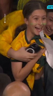 Sam Kerr gives away her jersey to a young fan