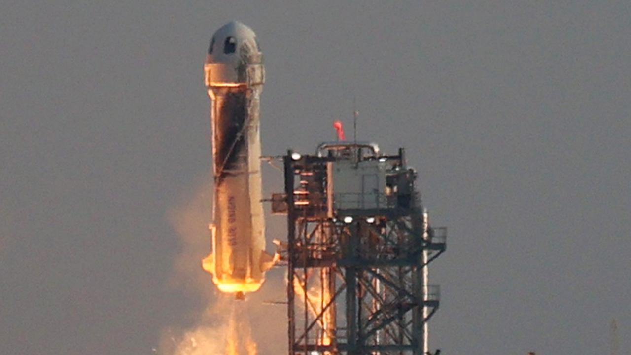 Blue Origin’s first human spaceflight with four private citizens on-board on July 20, 2021, including Jeff Bezos and his brother. Picture: Joe Raedle/Getty Images/AFP