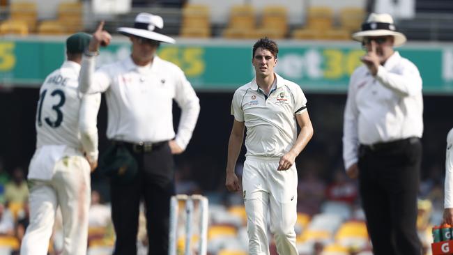 Cummins reacts after his wicket was checked then cleared for a front foot no ball. Picture: Getty