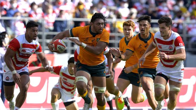 Rob Leota charges down the touchline after making a linebreak. Photo: Getty Images