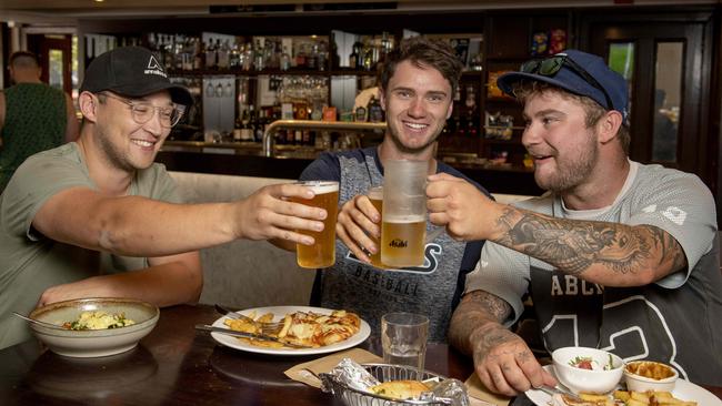 Mates Tim Prins, Josh Payne and Zach Lunnon at the Edinburgh Hotel in Boothby, after their baseball practice. Picture: Naomi Jellicoe