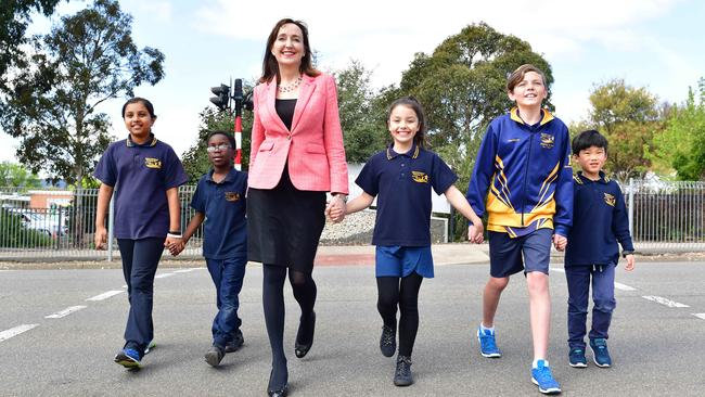 Education Minister Susan Close with Dernancourt Primary students for the launch of the 2017 road safety booklet. Picture: AAP/Keryn Stevens