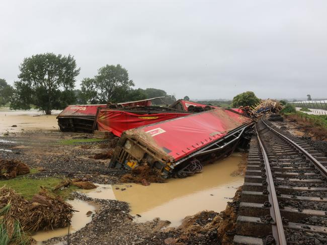 A train derailed near Teu Puke after heavy rain brought flooding across the North Island. Picture: Tyson Smith