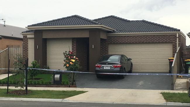 Police tape across a Greenvale home raided by police. Picture: Stephen Drill