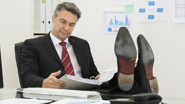 Generic photo of a lazy executive with his feet on the table. Picture: iStock