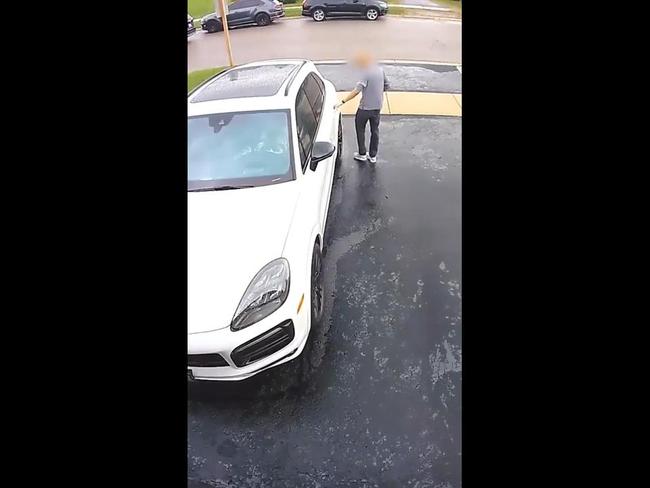 Shocking moment woman steals Porsche and runs down owner