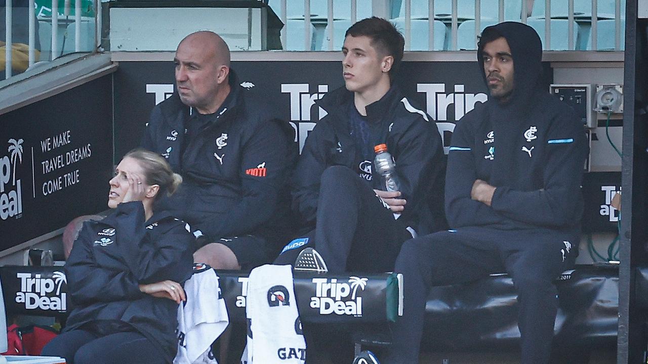 Jack Martin (right) after being subbed out in round 22. Picture: Michael Willson/AFL Photos via Getty Images