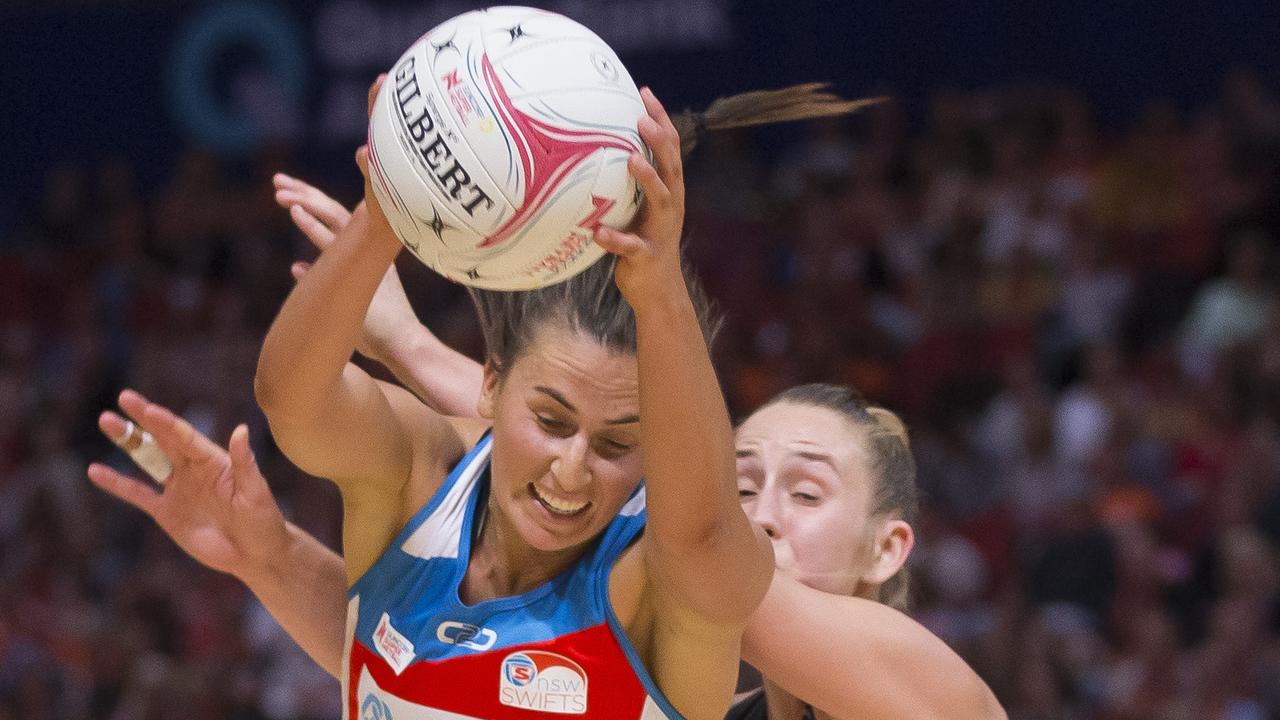 Maddy Proud of the Swifts and Jamie-Lee Price of the Giants during the Round 1 Super Netball match between the GWS Giants and the NSW Swifts at Qudos Arena in Sydney, Sunday, April 28, 2019. (AAP Image/Craig Golding) NO ARCHIVING, EDITORIAL USE ONLY