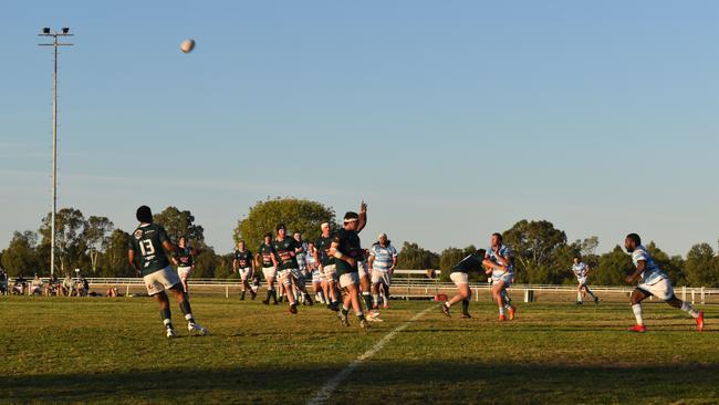 Spectators cheer on as they watch the A Grade Roma vs Condamine match at the Roma Rugby Races at Bassett Park. Picture: Chloe Cufflin.