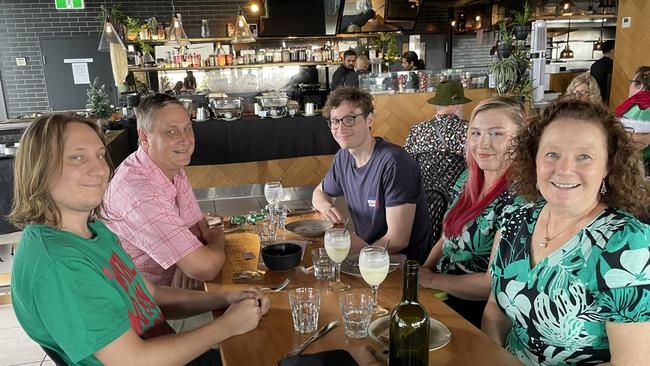 (L-R) Matthew, Steven, Lucas, Emma and Kim Rowe enjoying Christmas Day at the Wharf One in Darwin, 2022. Picture: Annabel Bowles