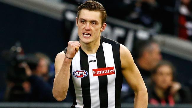 Darcy Moore celebrates a goal against West Coast during Round 19.