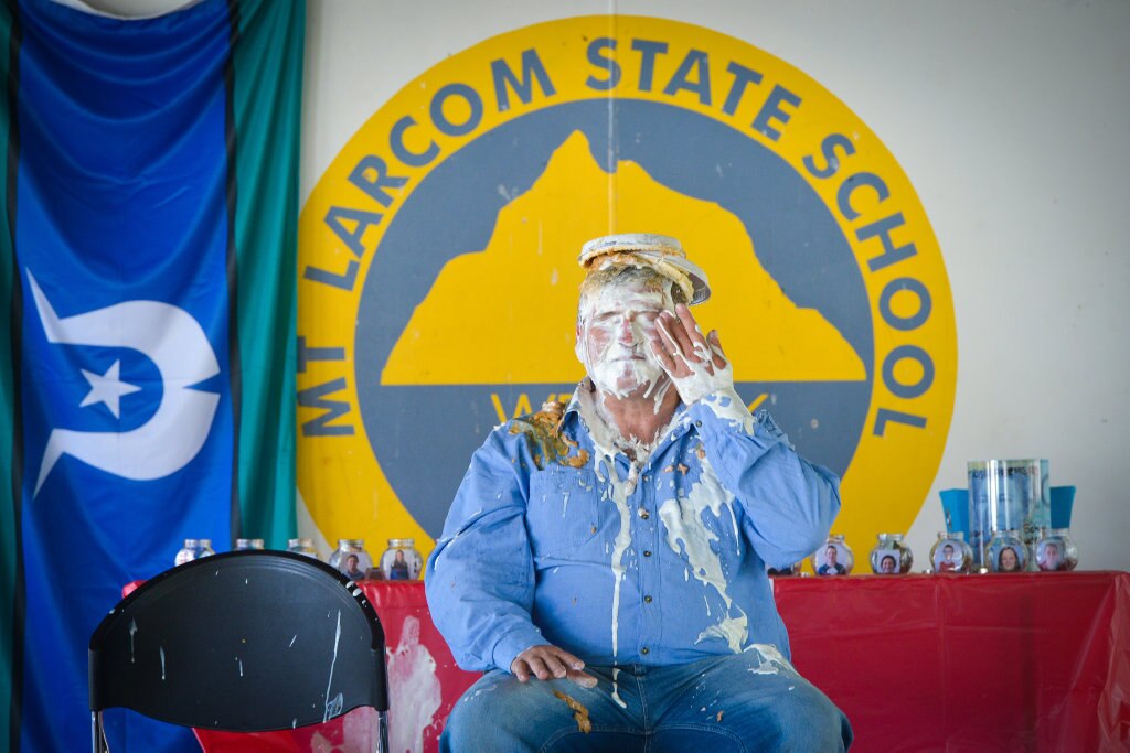 Teacher Norm HoranPIE IN THE FACE - Mt Larcom State School raises money for drought relief. Picture: Mike Richards GLA140918PIEF