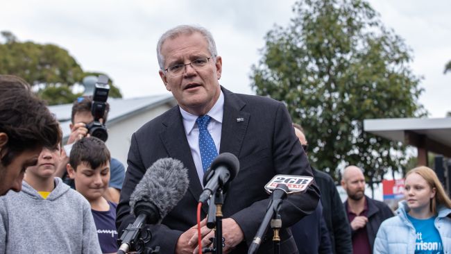Prime Minister Scott Morrison speaks to reporters after casting his vote in the Federal Election. Picture: Jason Edwards