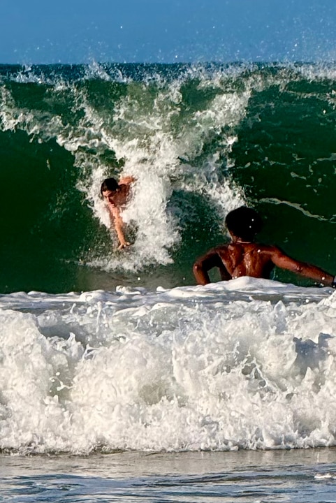 Surfers and swimmers crunched in big swell