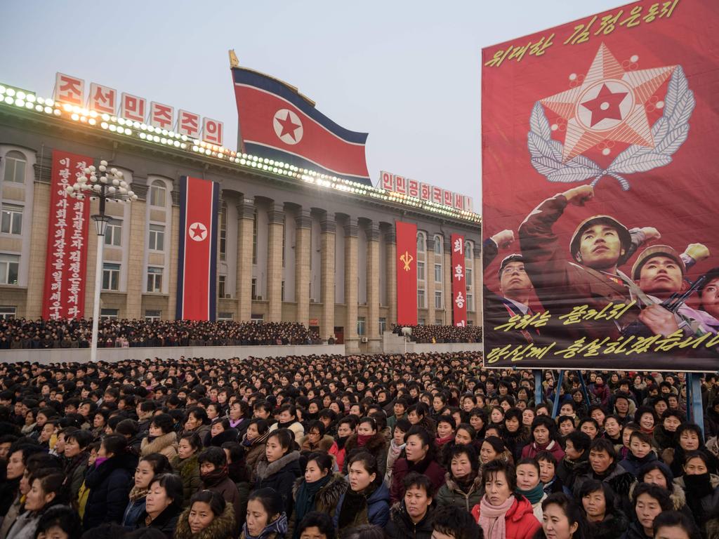 Thousands of North Koreans listen to a new year’s address by Kim Jong-un at Kim Il Sung square in Pyongyang earlier this month. Picture: AFP