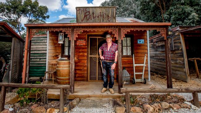 Chris Olver outside his old-fashioned picture theatre, in Mick Taylor get-up. Picture: Tim Carrafa.