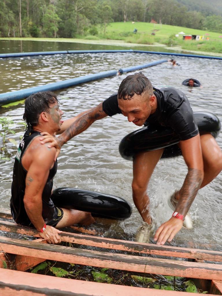 Daniel Rioli gives Shai Bolton a hand. Picture: Molly Stapleton/Richmond FC