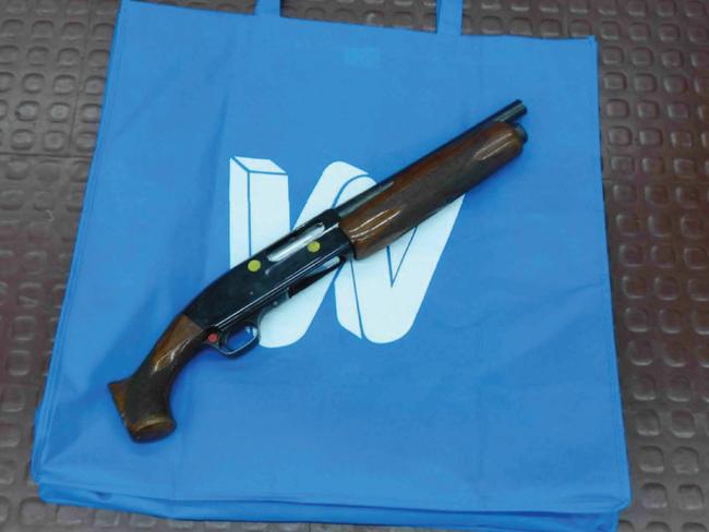 IMan Monis' shotgun and the Big W bag.