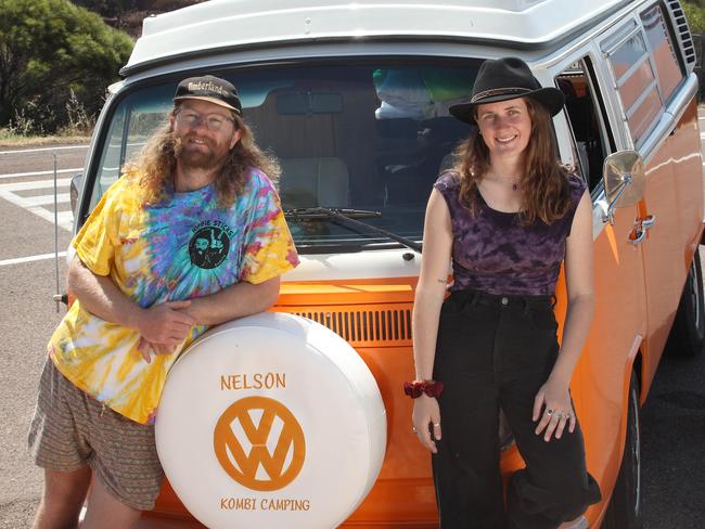 The Voice Van (Day 3) Whyalla - Angus Cameron,30, and Roxana Swanson Manuel, 25, with Nelson on Hummock Hill lookout. 5 October 2023. Picture Dean Martin