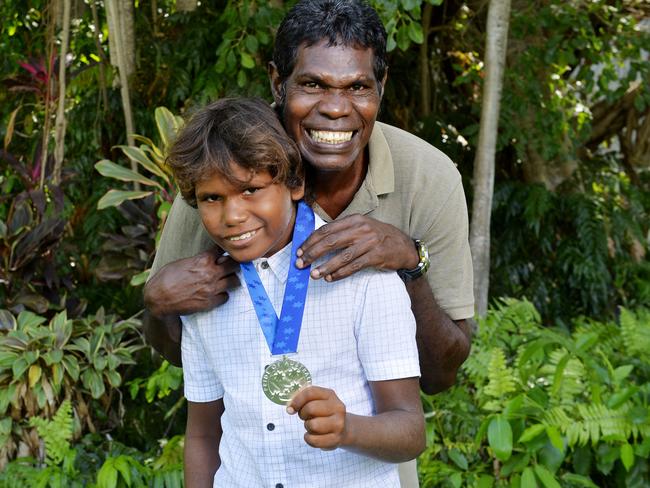 Northern Territory Pride of Australia Awards winners ... the Outstanding Bravery medal winner Shane Tipungwuti with his mother’s uncle James Tipungwuti.