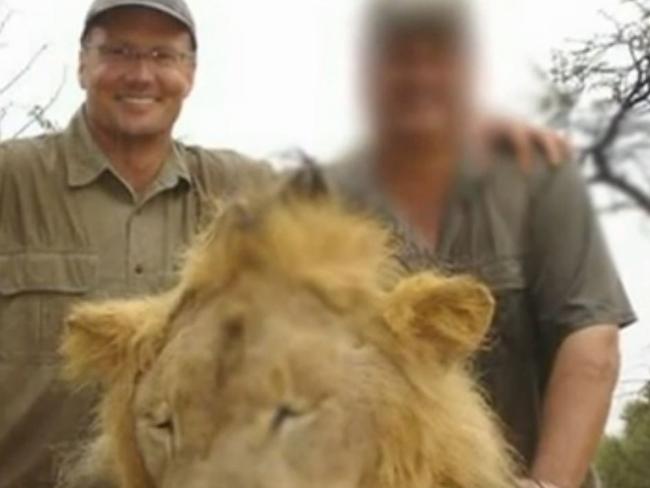 Blood sport ... Walter Palmer and a fellow hunter with a lion killed on a different occasion. Picture: Supplied