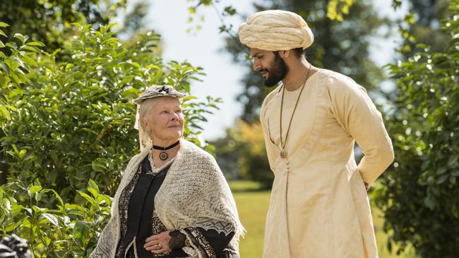 Judi Dench (as Queen Victoria) and Ali Fazal (as Abdul Karim) in Victoria and Abdul.