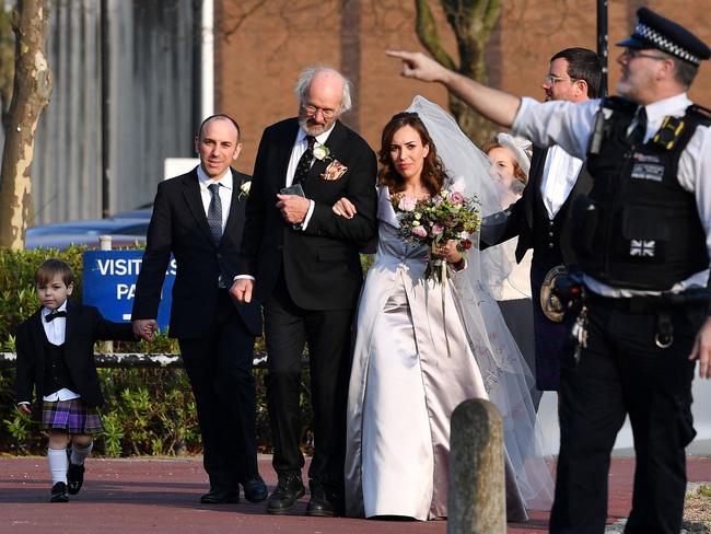 John Shipton with Stella Moris as they leave from Belmarsh Prison in London. Picture: AFP.