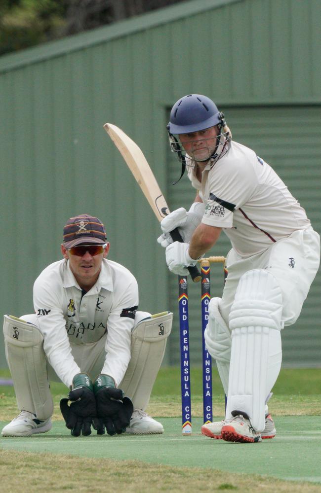 James La Brooy behind the stumps for Old Peninsula and Red Hill batter Simon Dart. Picture: Valeriu Campan