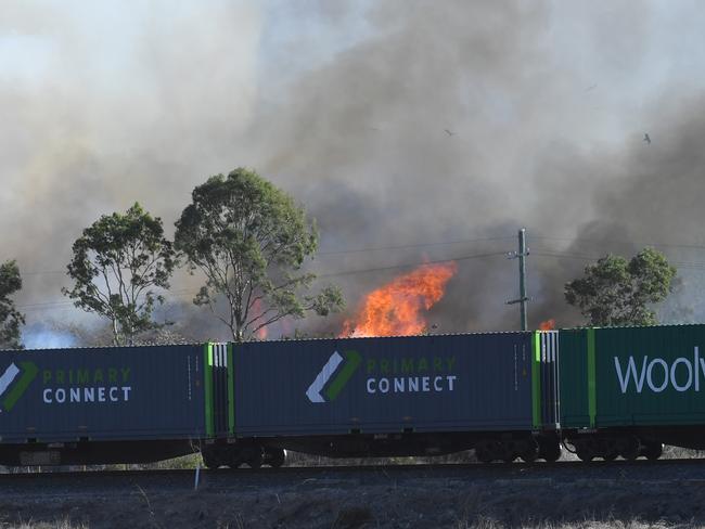 Scrub fire at Julago, just south of Townsville, causes delays to traffic on Bruce Highway. Picture: Evan Morgan