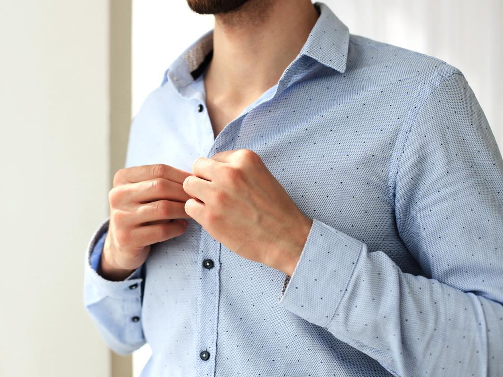 Why men and women's shirt buttons are on different sides